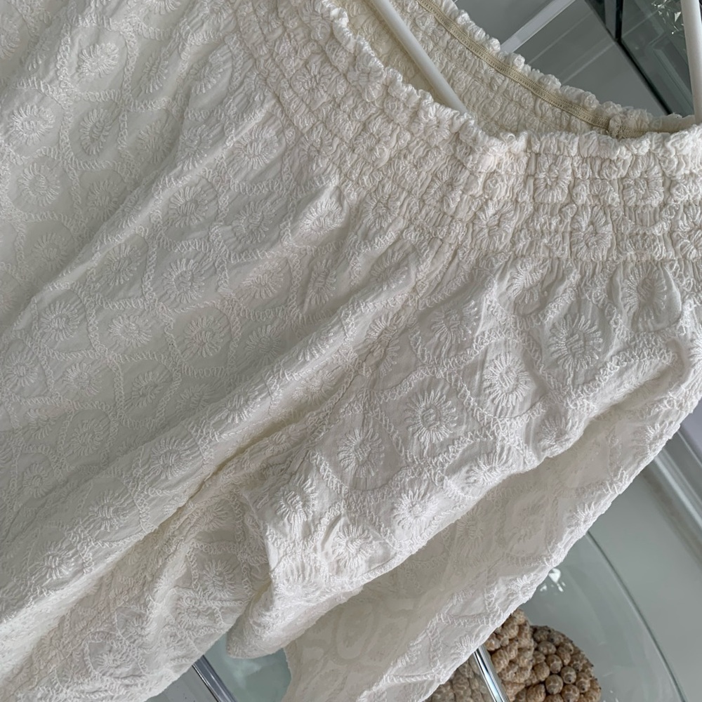 Ivory ,off shoulder cotton .brocade type top
